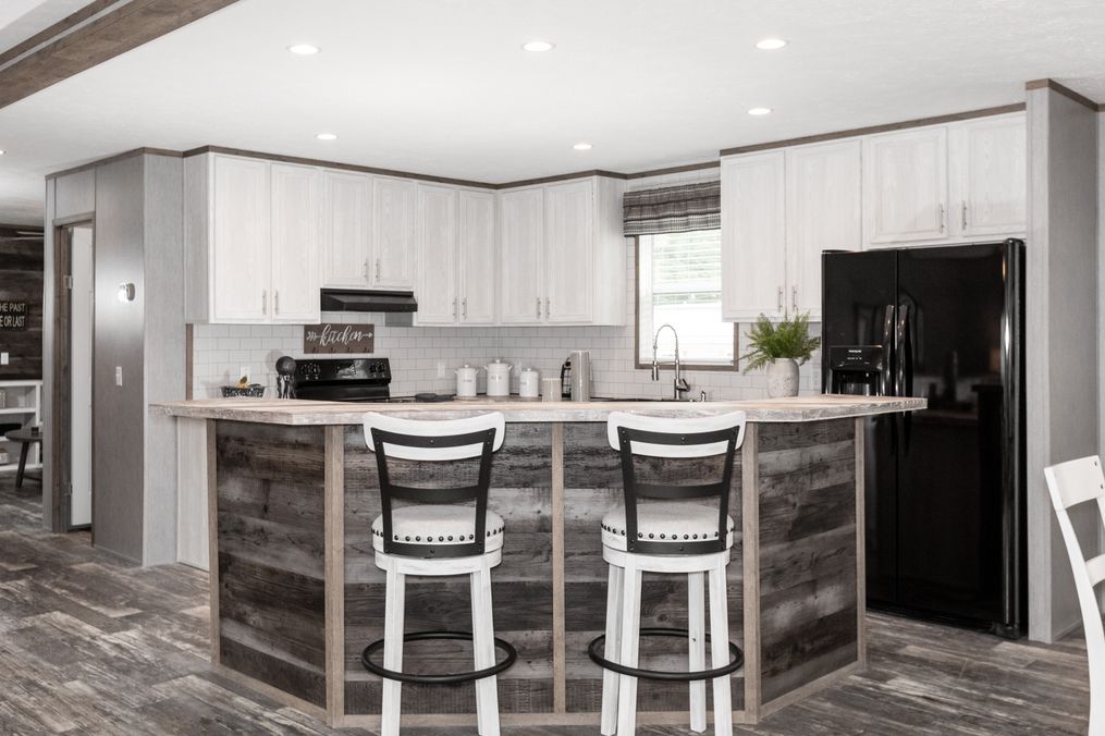 The THE MORRIS Kitchen. This Manufactured Mobile Home features 3 bedrooms and 2 baths.