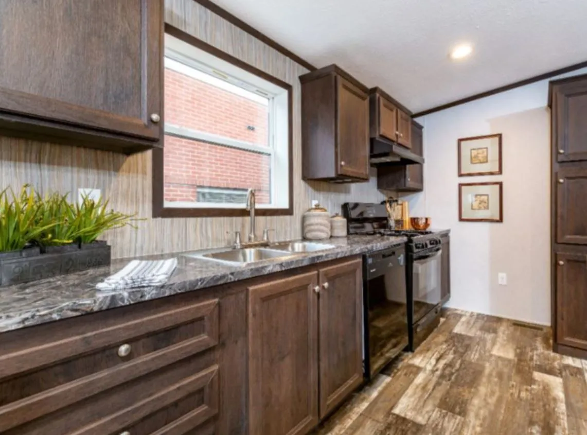 The ZIRCON Kitchen. This Manufactured Mobile Home features 3 bedrooms and 2 baths.