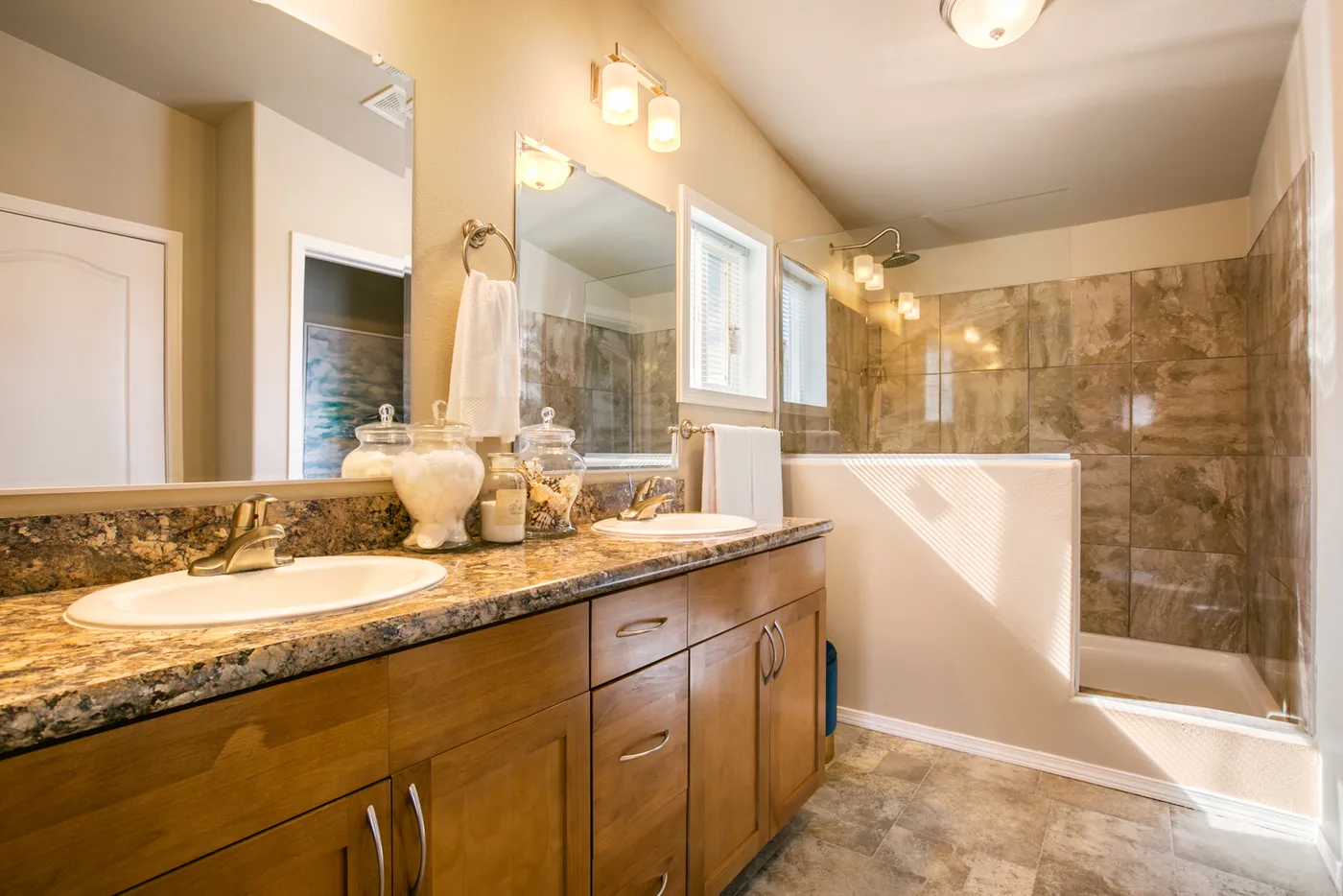 The THE WAVE Primary Bathroom. This Manufactured Mobile Home features 4 bedrooms and 2 baths.