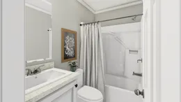The 926 ADVANTAGE PLUS 7616 Guest Bathroom. This Manufactured Mobile Home features 3 bedrooms and 2 baths.