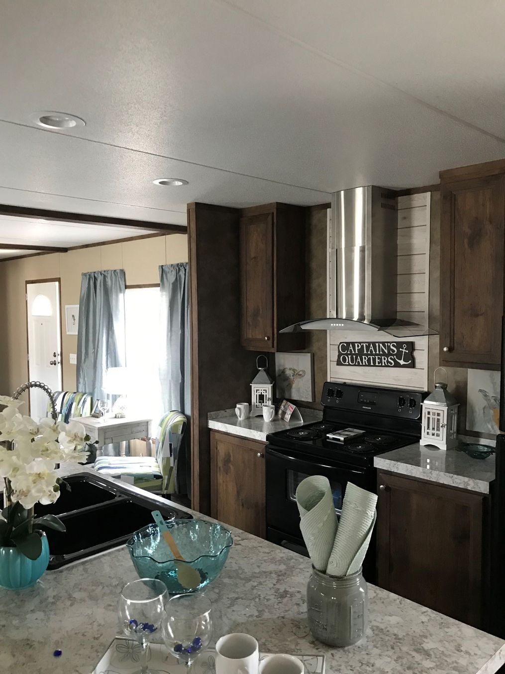The THE ANNIVERSARY SPLASH Kitchen. This Manufactured Mobile Home features 3 bedrooms and 2 baths.