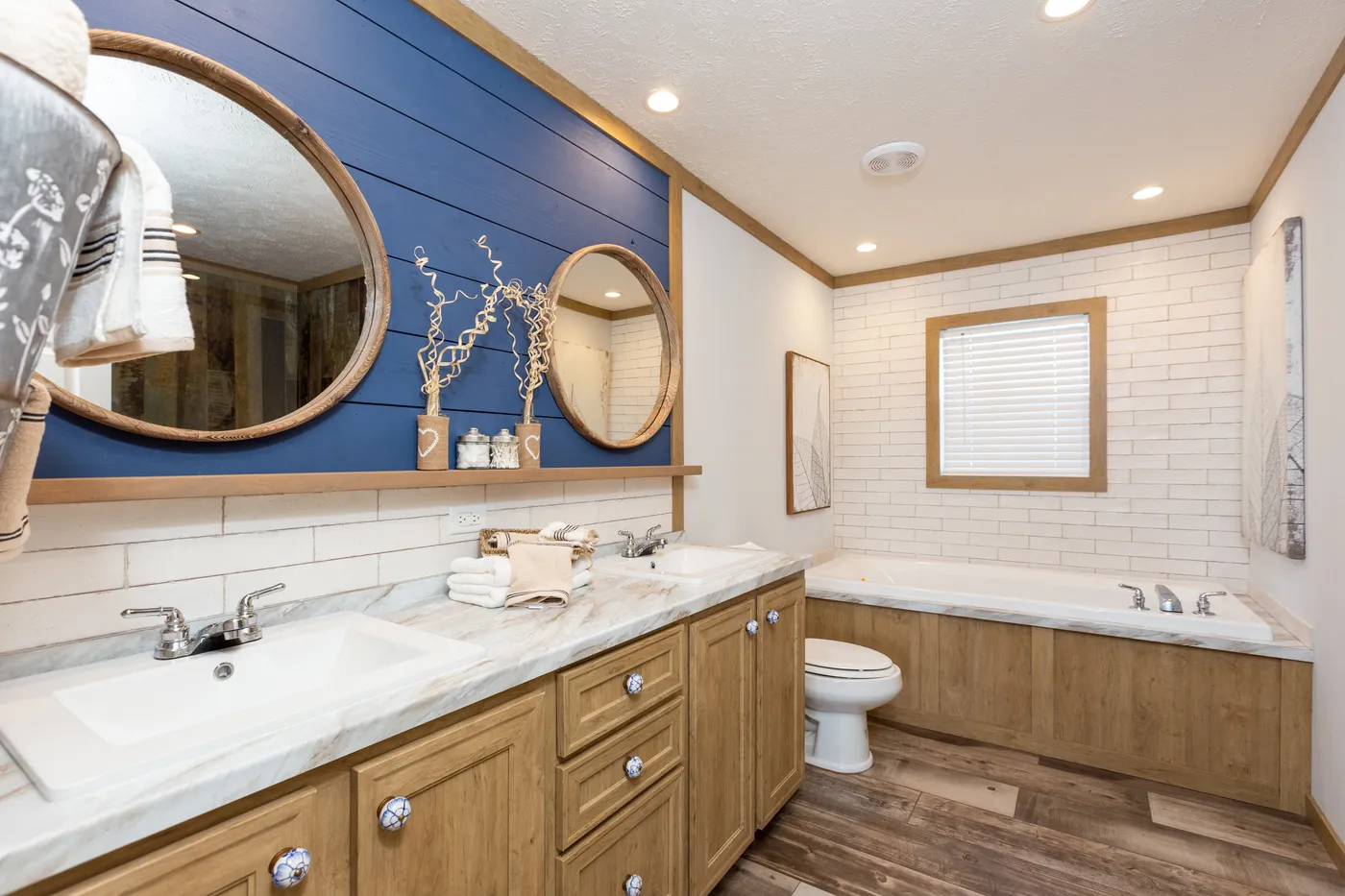 The THE KIMMEL Primary Bathroom. This Manufactured Mobile Home features 3 bedrooms and 2 baths.