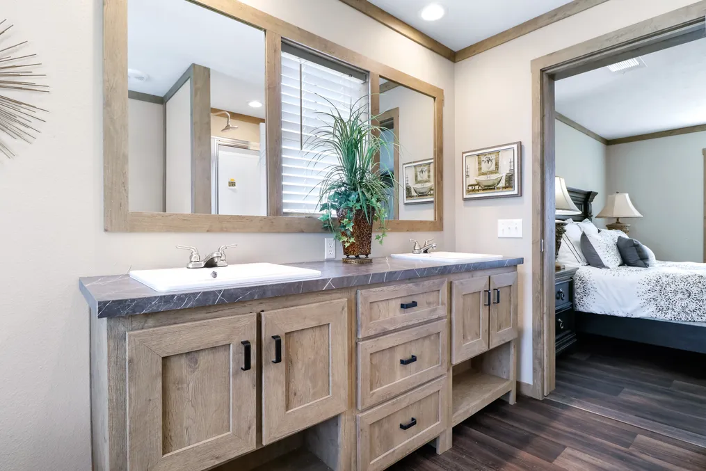 The AIMEE Primary Bathroom. This Manufactured Mobile Home features 3 bedrooms and 2 baths.