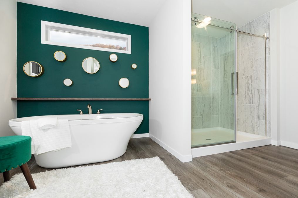 The TAYLOR 6430-9062 SECT Primary Bathroom. This Manufactured Mobile Home features 3 bedrooms and 2 baths.