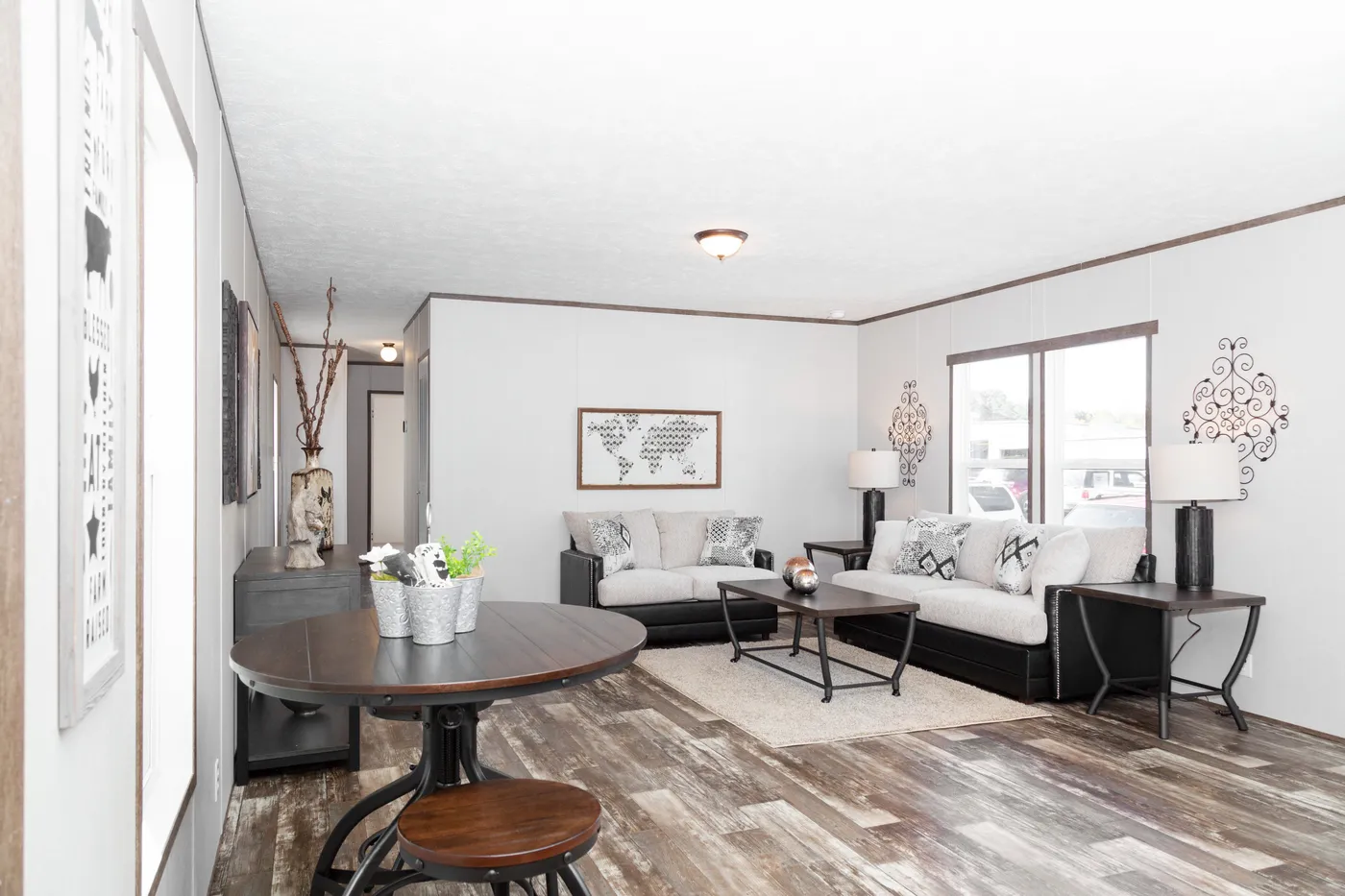 The THE BREEZE Living Room. This Manufactured Mobile Home features 3 bedrooms and 2 baths.