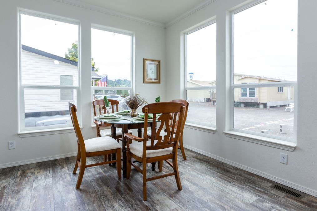 The 2848 MARLETTE SPECIAL Dining Area. This Manufactured Mobile Home features 3 bedrooms and 2 baths.