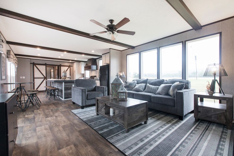 The THE SEASIDE Living Room. This Manufactured Mobile Home features 3 bedrooms and 2 baths.
