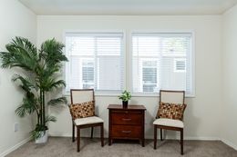 The FAIRPOINT 14602A Primary Bedroom. This Manufactured Mobile Home features 2 bedrooms and 2 baths.