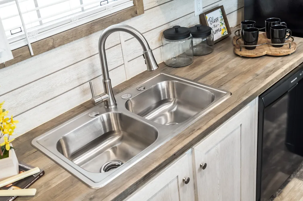The ULTRA PRO 56B Kitchen. This Manufactured Mobile Home features 3 bedrooms and 2 baths.