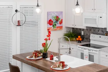 The 1439 CAROLINA "MAGNOLIA" Kitchen. This Manufactured Mobile Home features 3 bedrooms and 2 baths.