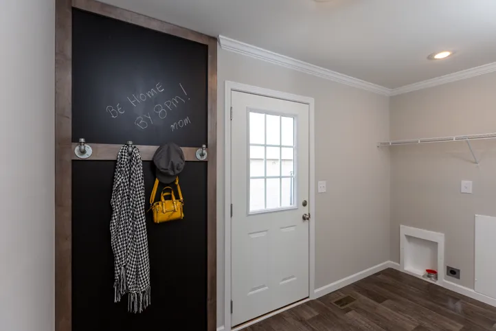 The THE FREEDOM SOHO Utility Room. This Manufactured Mobile Home features 3 bedrooms and 2 baths.