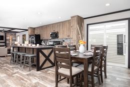 The BOUJEE Dining Area. This Manufactured Mobile Home features 3 bedrooms and 2 baths.