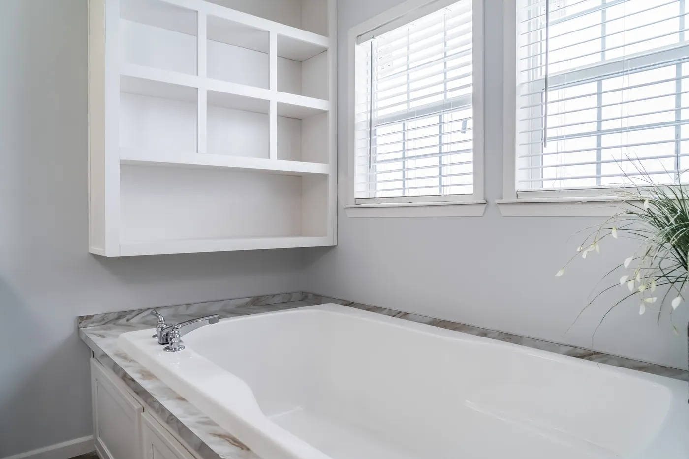 The THE LEAHY Primary Bathroom. This Manufactured Mobile Home features 4 bedrooms and 2 baths.