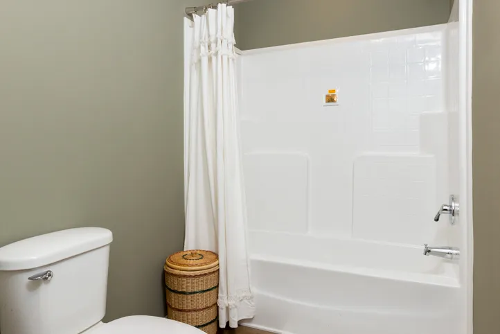 The KEENELAND Guest Bathroom. This Manufactured Mobile Home features 3 bedrooms and 2 baths.