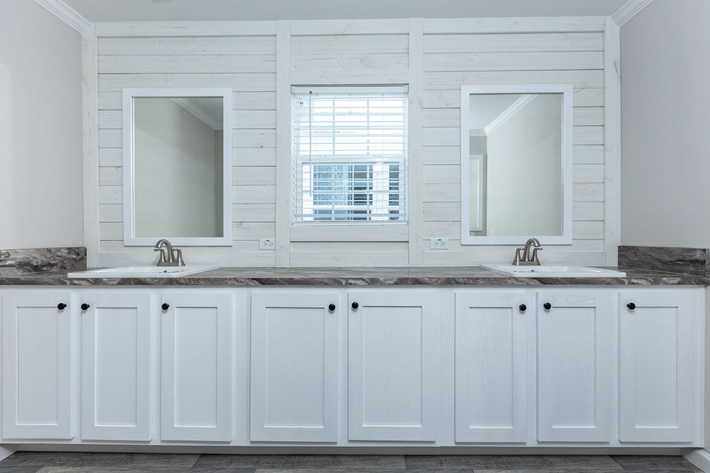 The THE FREEDOM BREEZE Primary Bathroom. This Manufactured Mobile Home features 3 bedrooms and 2 baths.