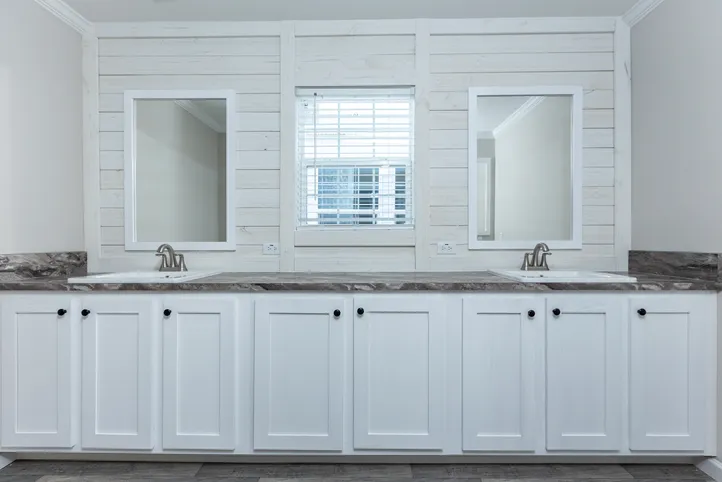The THE FREEDOM BREEZE Primary Bathroom. This Manufactured Mobile Home features 3 bedrooms and 2 baths.