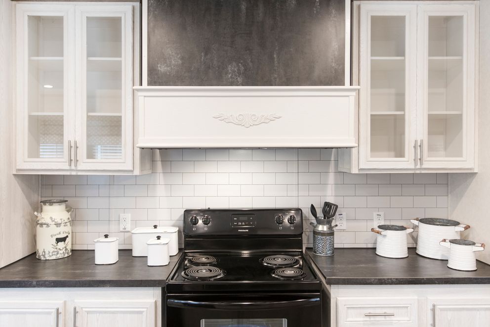 The THE SOUTHERN FARMHOUSE Kitchen. This Manufactured Mobile Home features 3 bedrooms and 2 baths.