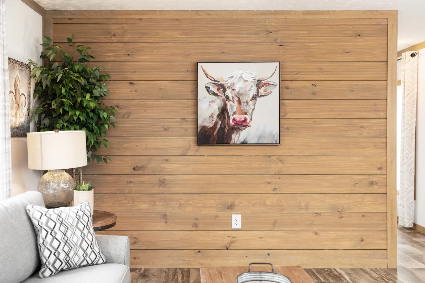 The THE BEXAR Living Room. This Manufactured Mobile Home features 3 bedrooms and 2 baths.