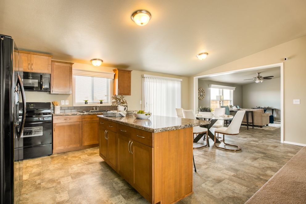 The THE WAVE Kitchen. This Manufactured Mobile Home features 4 bedrooms and 2 baths.