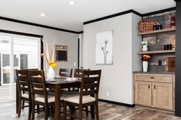 The BOUJEE Dining Area. This Manufactured Mobile Home features 3 bedrooms and 2 baths.