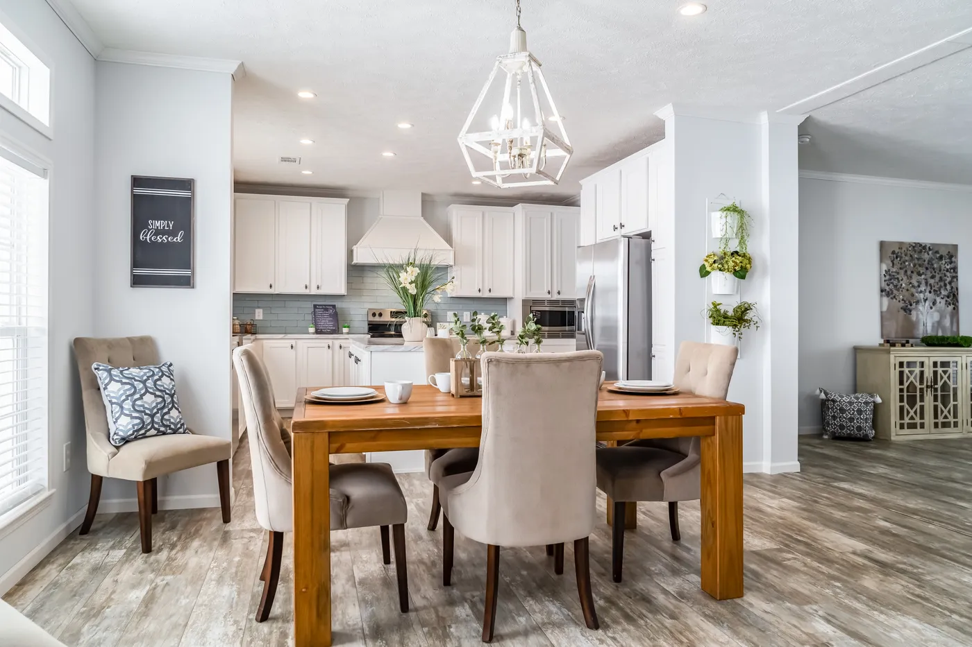 The THE INGRAM Dining Room. This Manufactured Mobile Home features 3 bedrooms and 2 baths.