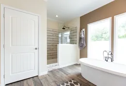 The SOUTHERN CHARM 4 BR Primary Bathroom. This Manufactured Mobile Home features 4 bedrooms and 2 baths.