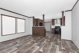 The THE POWERHOUSE Living Room. This Manufactured Mobile Home features 3 bedrooms and 2 baths.