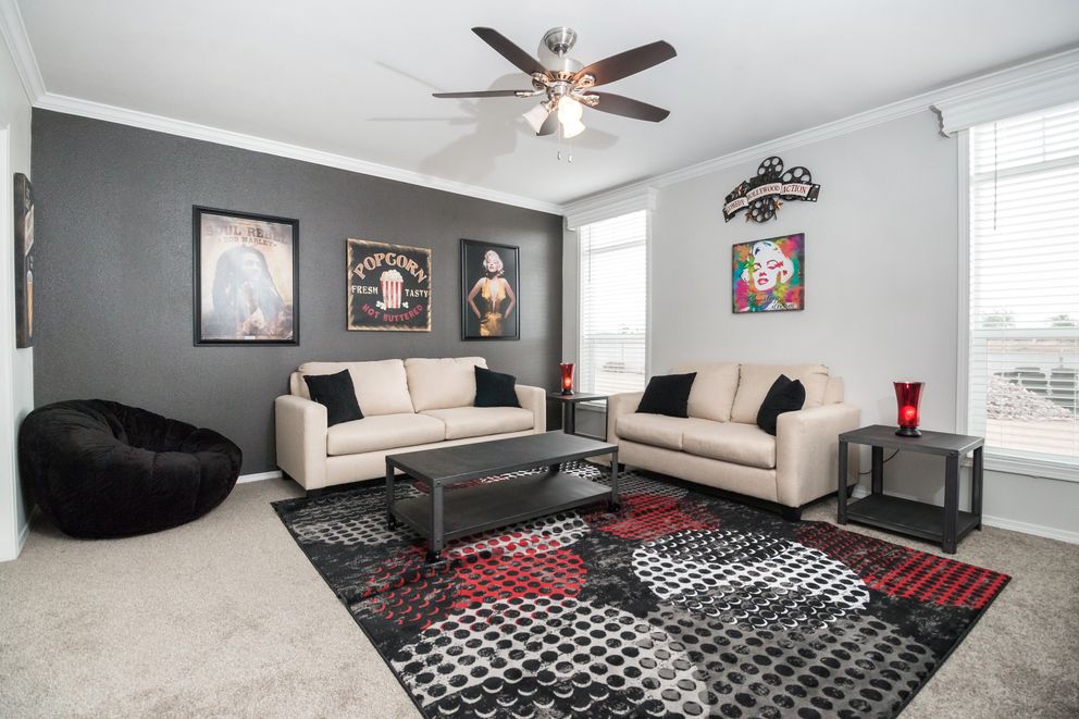 The ENCHANTMENT 3070A Den. This Manufactured Mobile Home features 3 bedrooms and 2 baths.