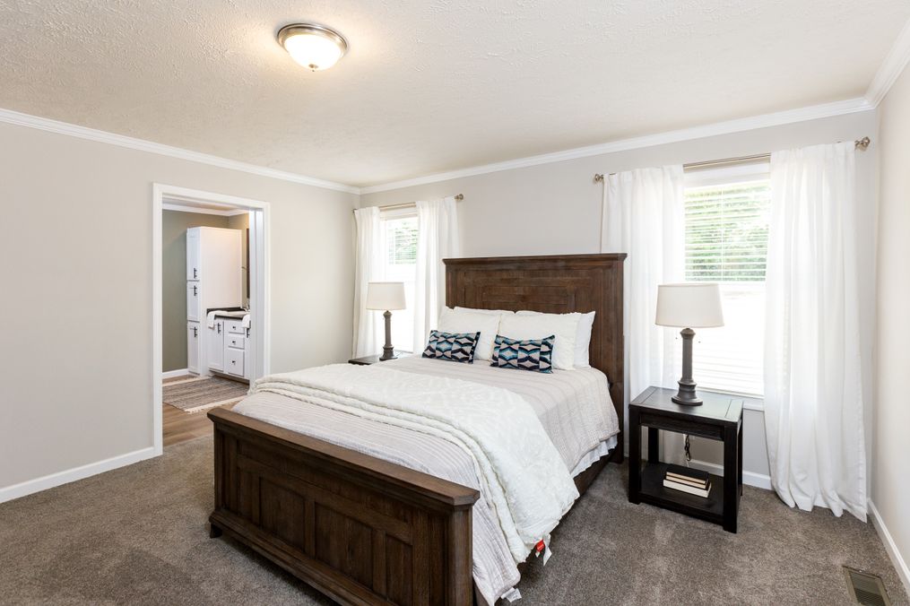 The KEENELAND Master Bedroom. This Manufactured Mobile Home features 3 bedrooms and 2 baths.