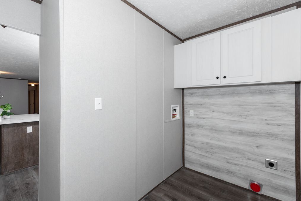 The BLAZER 76 P Utility Room. This Manufactured Mobile Home features 3 bedrooms and 2 baths.