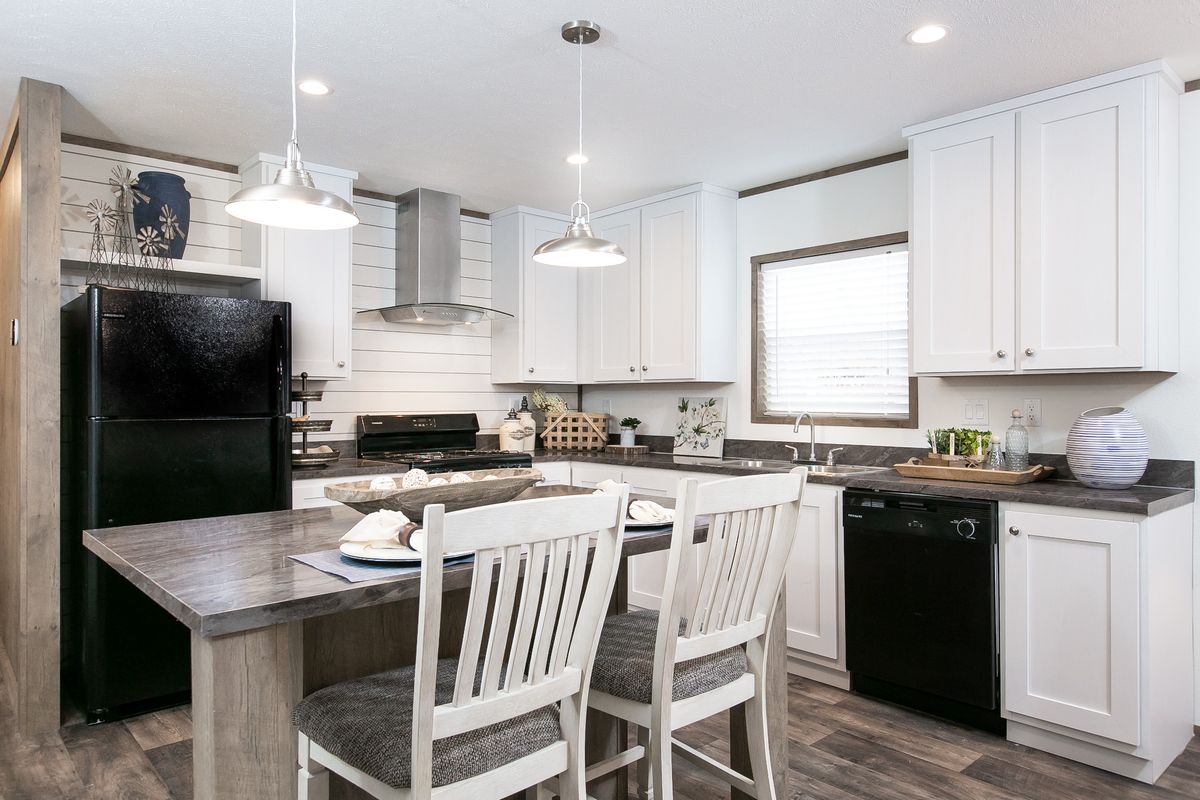 The LIFESTYLE 207 Kitchen. This Manufactured Mobile Home features 3 bedrooms and 2 baths.