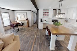 The BREEZE FARMHOUSE 72 Kitchen. This Manufactured Mobile Home features 4 bedrooms and 2 baths.