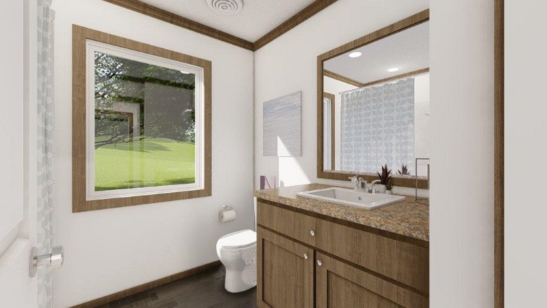 The THE WASHINGTON Guest Bathroom. This Manufactured Mobile Home features 3 bedrooms and 2 baths.