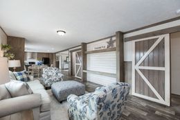 The THE BREEZE II Family Room. This Manufactured Mobile Home features 4 bedrooms and 2 baths.