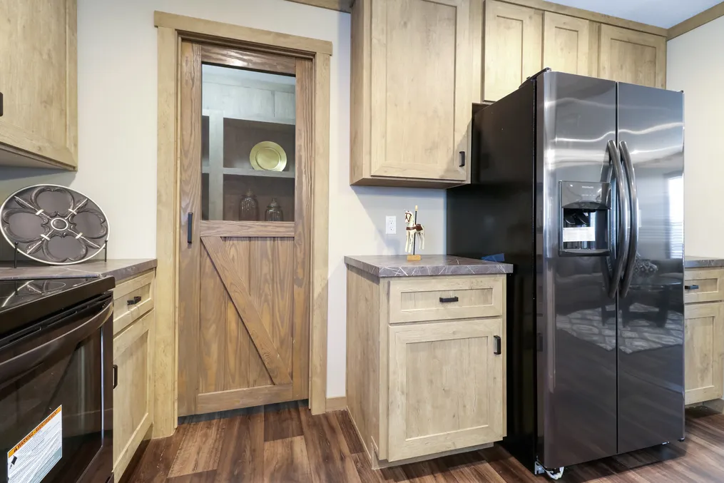 The AMELIA Kitchen. This Manufactured Mobile Home features 4 bedrooms and 2 baths.