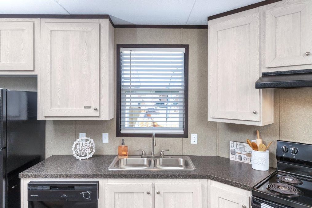 The CHALLENGER 16763B Kitchen. This Manufactured Mobile Home features 3 bedrooms and 2 baths.