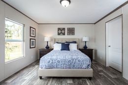 The THE NEW BREEZE II Master Bedroom. This Manufactured Mobile Home features 4 bedrooms and 2 baths.