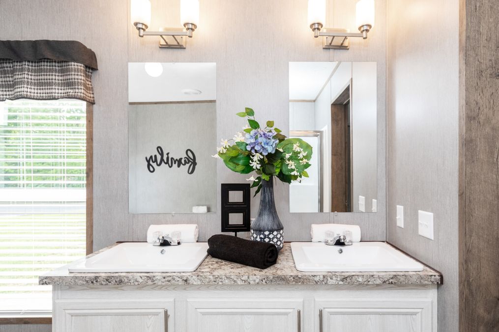 The THE MORRIS Primary Bathroom. This Manufactured Mobile Home features 3 bedrooms and 2 baths.
