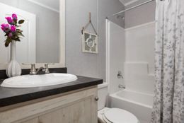 The TOPAZ Guest Bathroom. This Manufactured Mobile Home features 3 bedrooms and 2 baths.