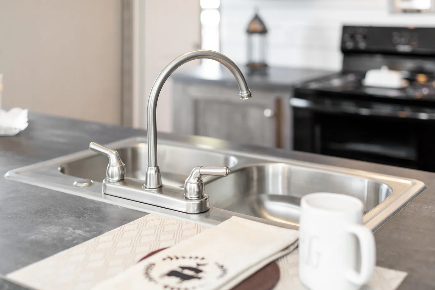 The THE BREEZE Kitchen. This Manufactured Mobile Home features 3 bedrooms and 2 baths.
