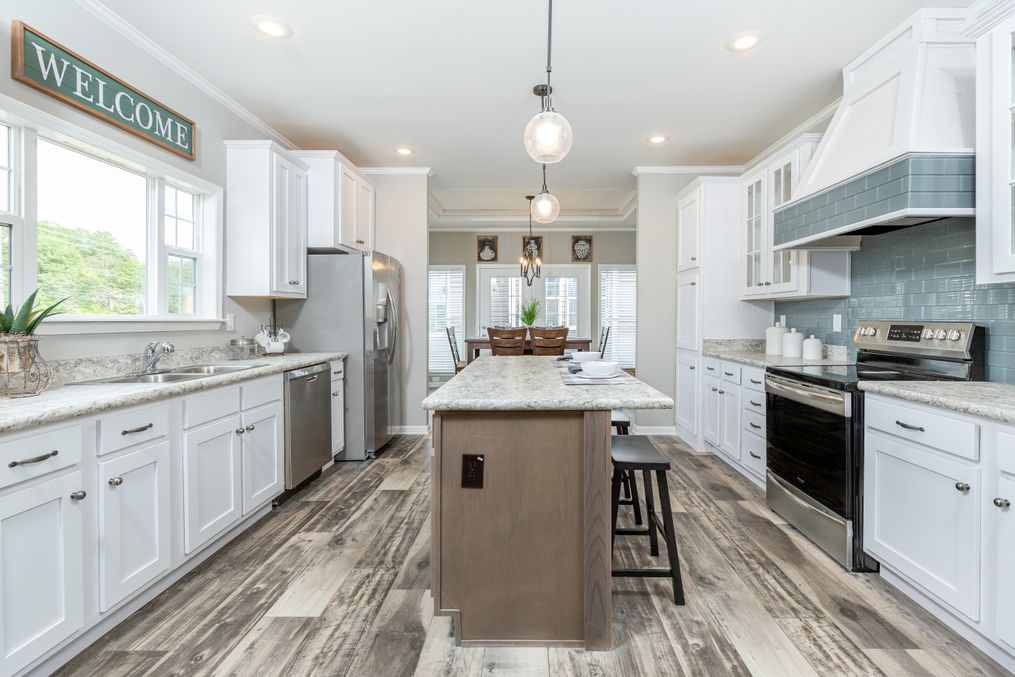 The 1714 HERITAGE Kitchen. This Manufactured Mobile Home features 3 bedrooms and 2 baths.