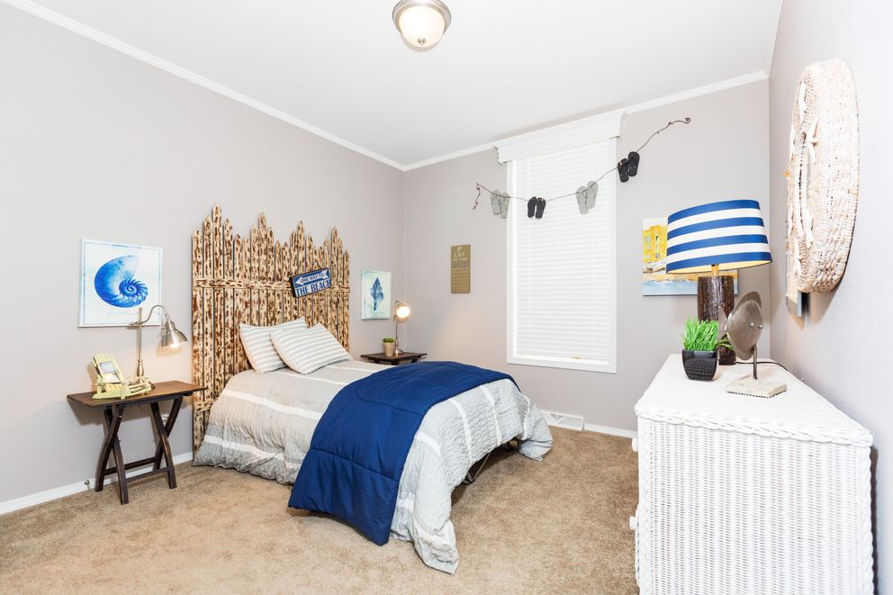 The ENCHANTMENT 3070A Bedroom. This Manufactured Mobile Home features 3 bedrooms and 2 baths.