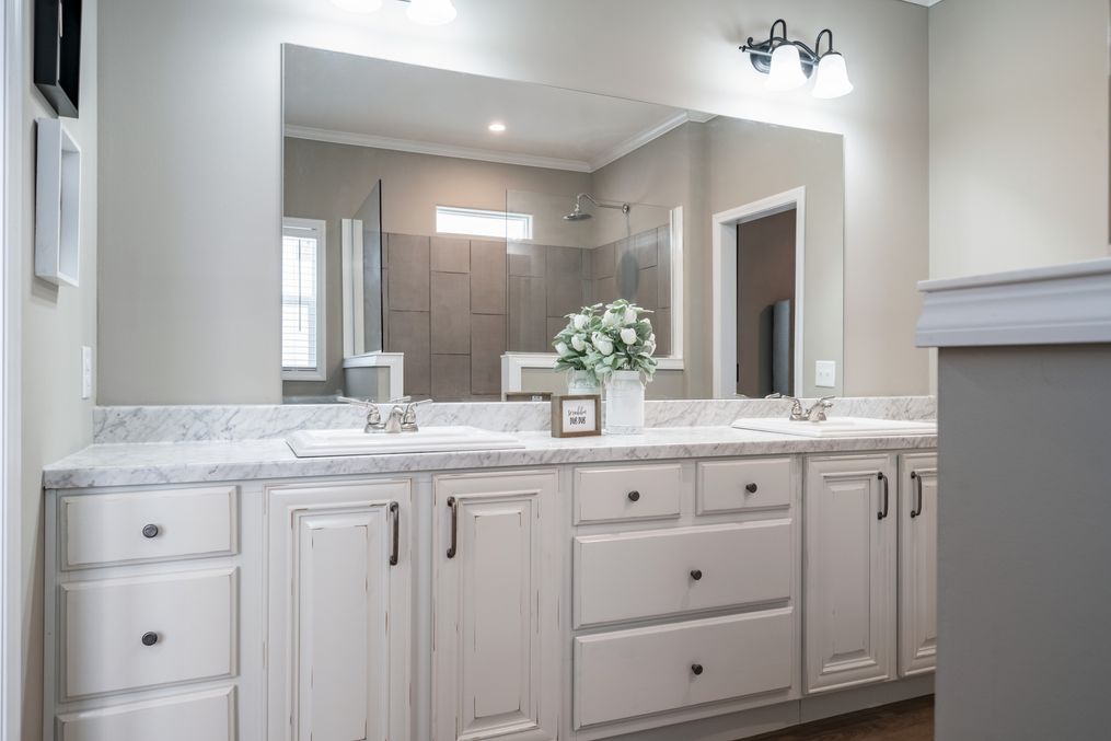 The THE ABIGAIL Master Bathroom. This Manufactured Mobile Home features 3 bedrooms and 2 baths.