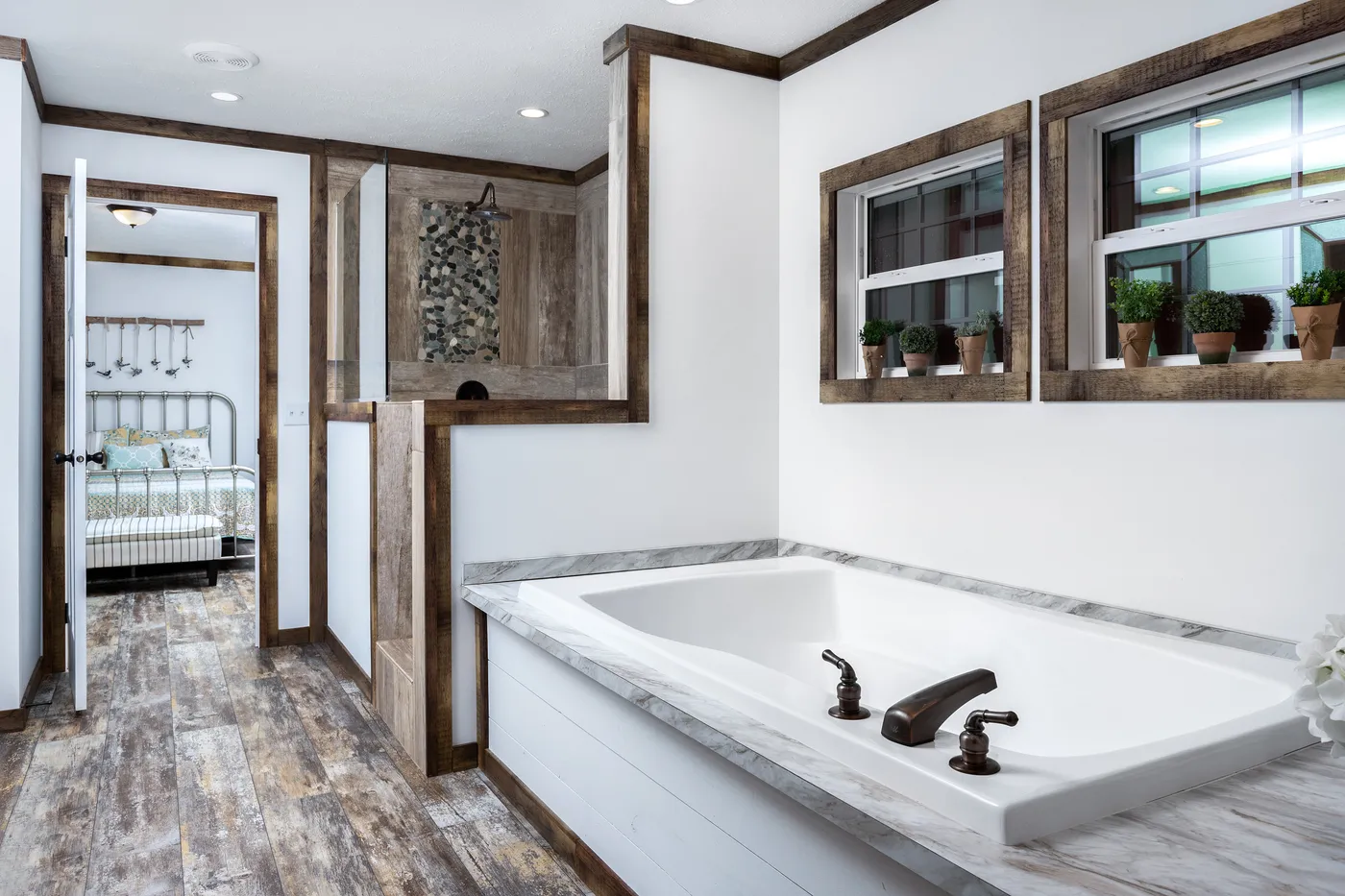 The THE LIZA JANE Primary Bathroom. This Manufactured Mobile Home features 3 bedrooms and 2 baths.