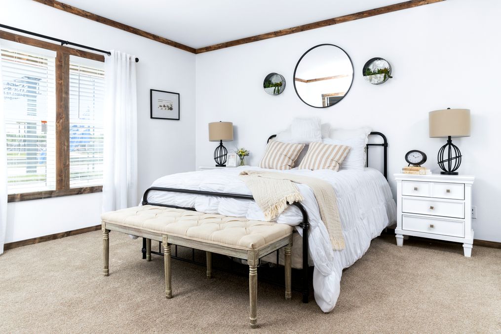 The THE DAISY-MAE Master Bedroom. This Manufactured Mobile Home features 3 bedrooms and 2 baths.