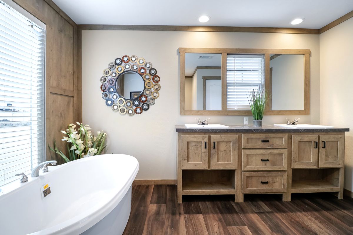 The AMELIA Master Bathroom. This Manufactured Mobile Home features 4 bedrooms and 2 baths.