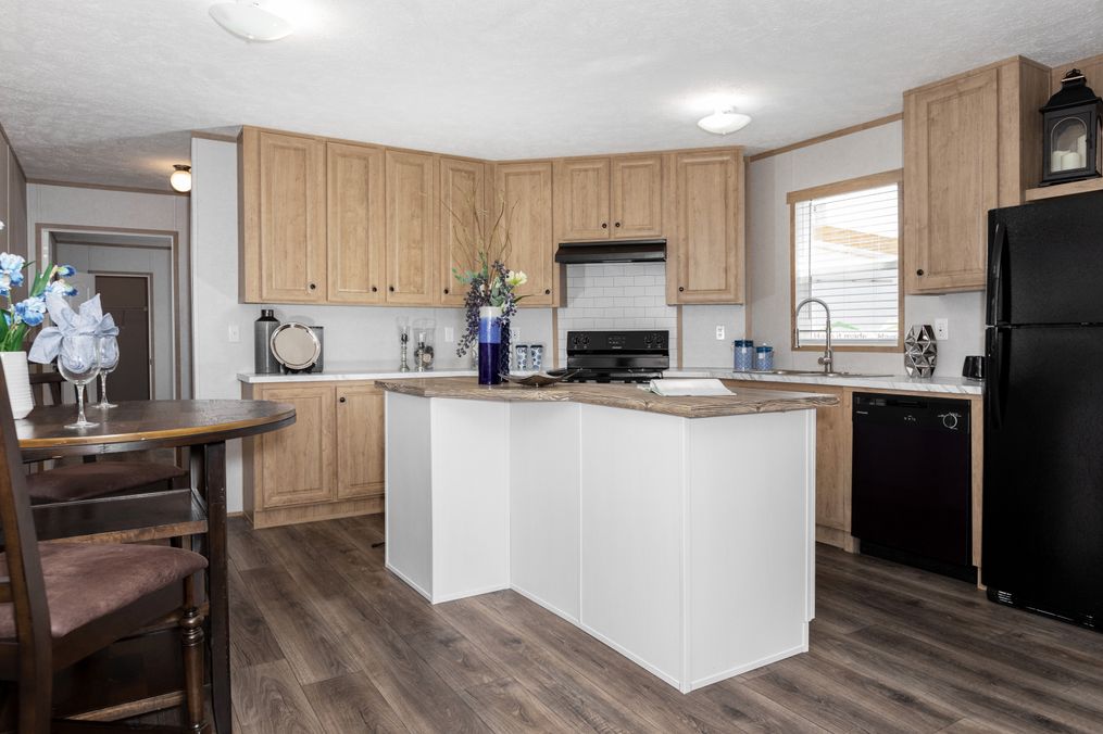 The BLAZER 76 C Kitchen. This Manufactured Mobile Home features 3 bedrooms and 2 baths.