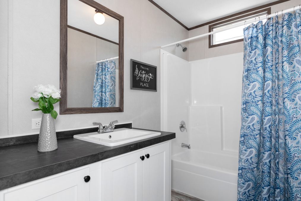The HAWTHORNE Guest Bathroom. This Manufactured Mobile Home features 3 bedrooms and 2 baths.