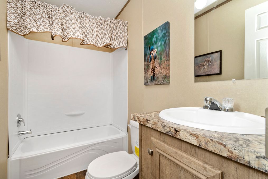 The THE HANCOCK Guest Bathroom. This Manufactured Mobile Home features 2 bedrooms and 2 baths.