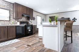 The CRAZY EIGHTS Kitchen. This Manufactured Mobile Home features 4 bedrooms and 2 baths.